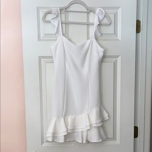 BCBGeneration White Textured Dress with Ruffle Detail